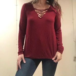 Red, flowy long sleeve v neck tee